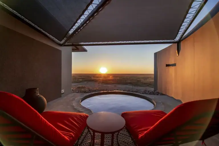 Private plunge pool at sunset at Etosha King Nehale