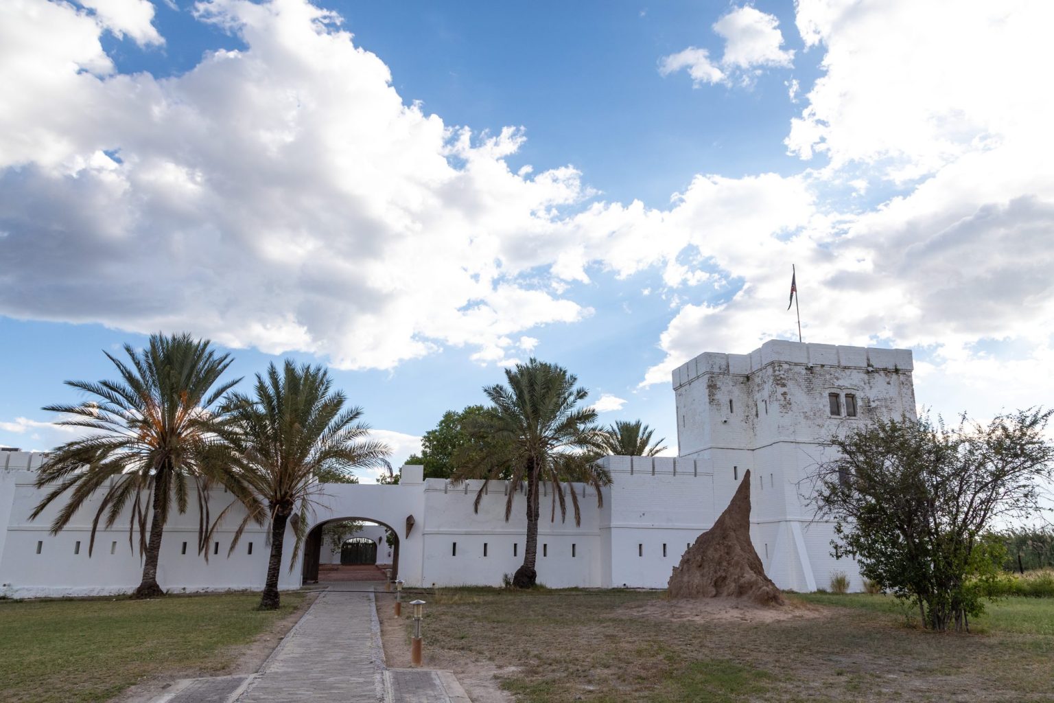 Fort Namutoni white walls and palm avenue in eastern Etosha